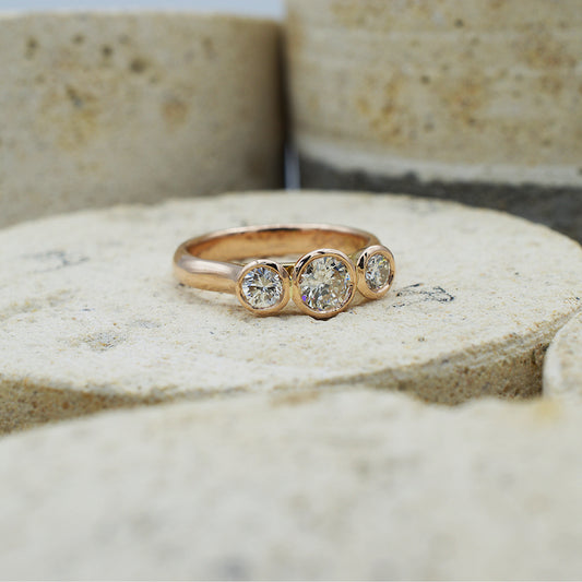 3 stone round diamond engagement ring remodel