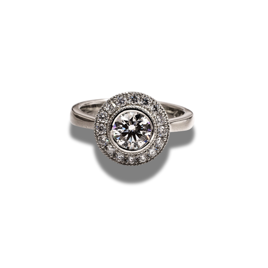 CAELORA | ROUND DIAMOND ENGAGEMENT RING WITH HALO